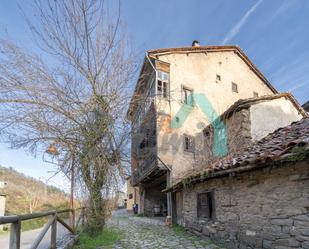 Exterior view of Single-family semi-detached for sale in Quirós  with Parquet flooring and Storage room