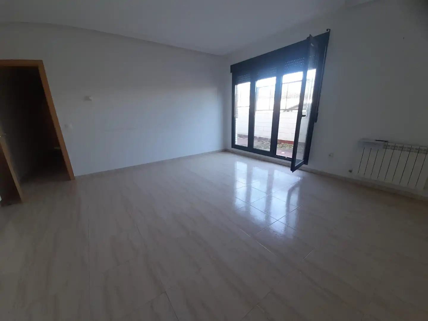 Sala de estar de Planta baja en venta en Puertollano con Calefacción, Trastero y Piscina comunitaria