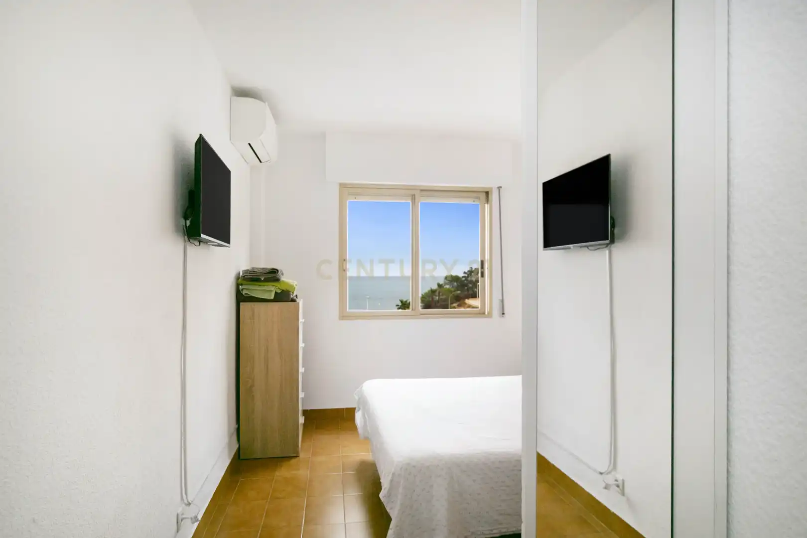 Dormitori de Apartament de lloguer en Calpe / Calp amb Aire condicionat, Rentadora i Microones