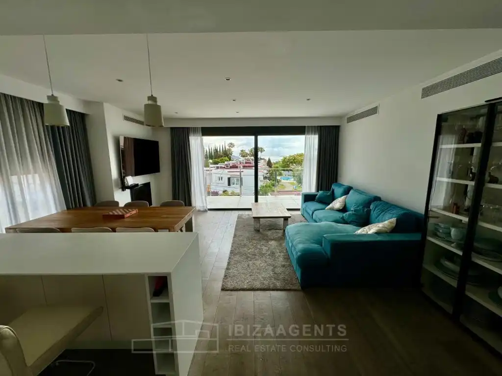 Sala de estar de Apartamento en venta en Santa Eulària des Riu con Aire acondicionado, Calefacción y Piscina