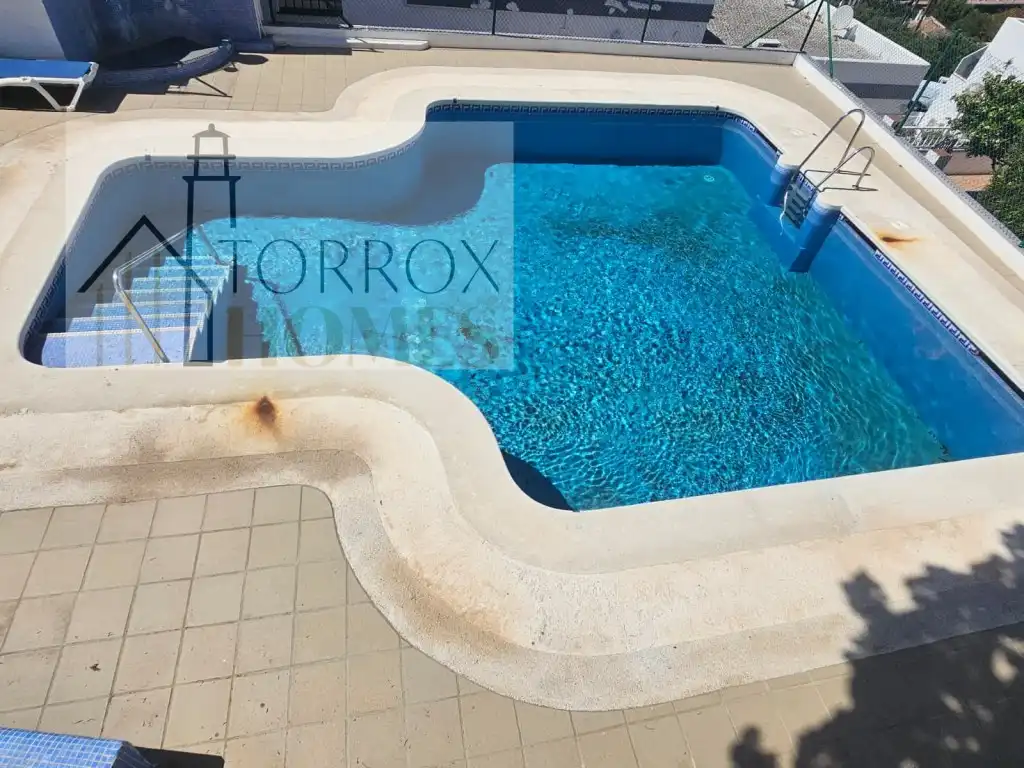 Swimming pool of Apartments for sale in Torrox