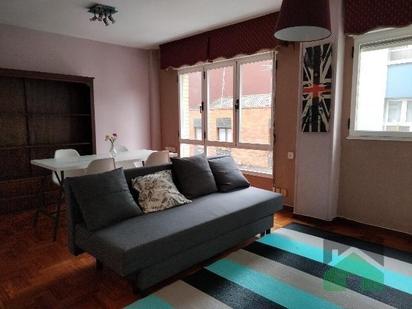 Living room of Flat for sale in Gijón   with Heating, Parquet flooring and Furnished