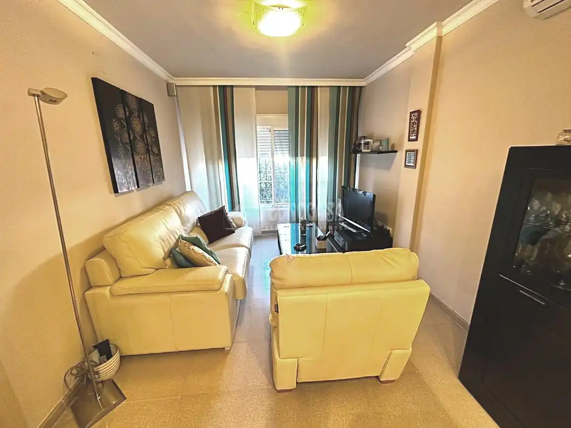 Sala de estar de Casa adosada en venta en Málaga con Aire acondicionado, Jardín privado y Terraza