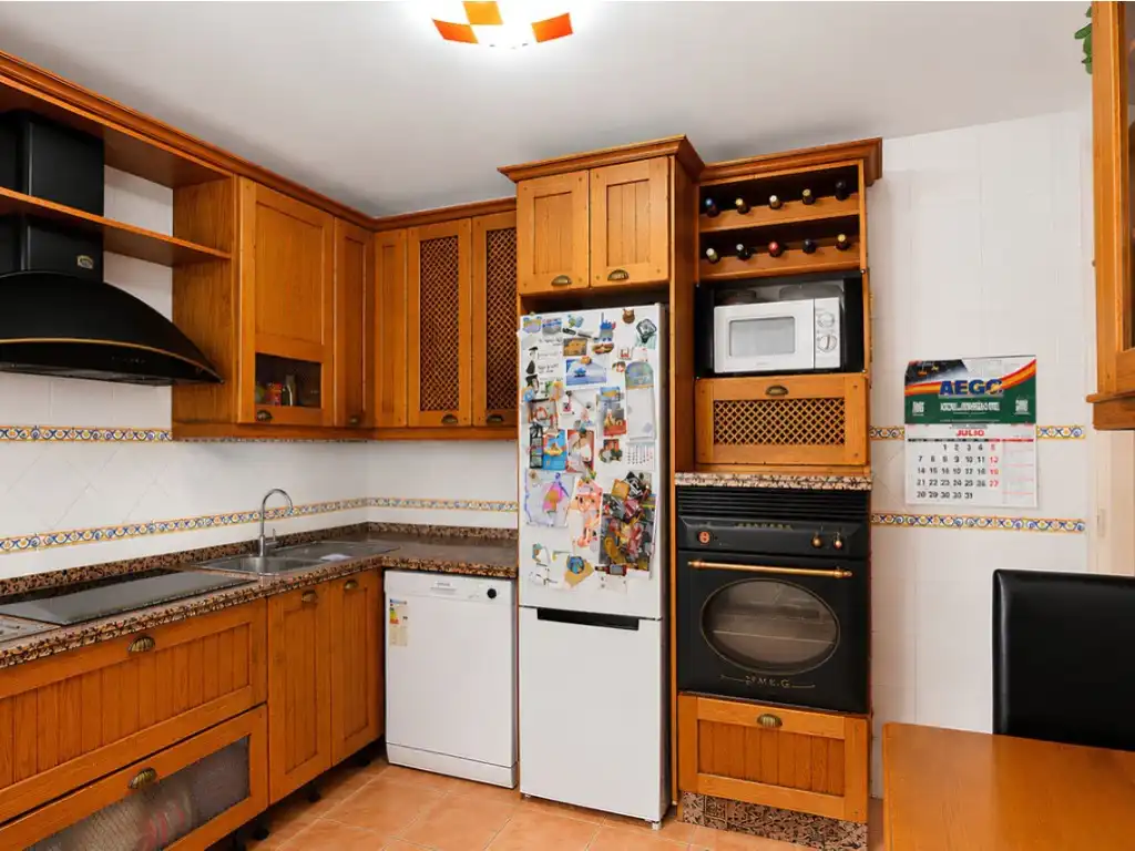 Cocina de Casa adosada en venta en Benalmádena con Aire acondicionado, Jardín privado y Amueblado