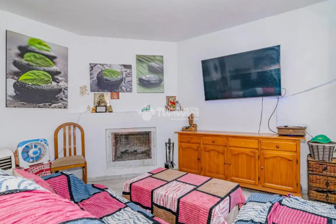 Sala d'estar de Casa adosada en venda en La Zubia amb Terrassa i Piscina comunitària