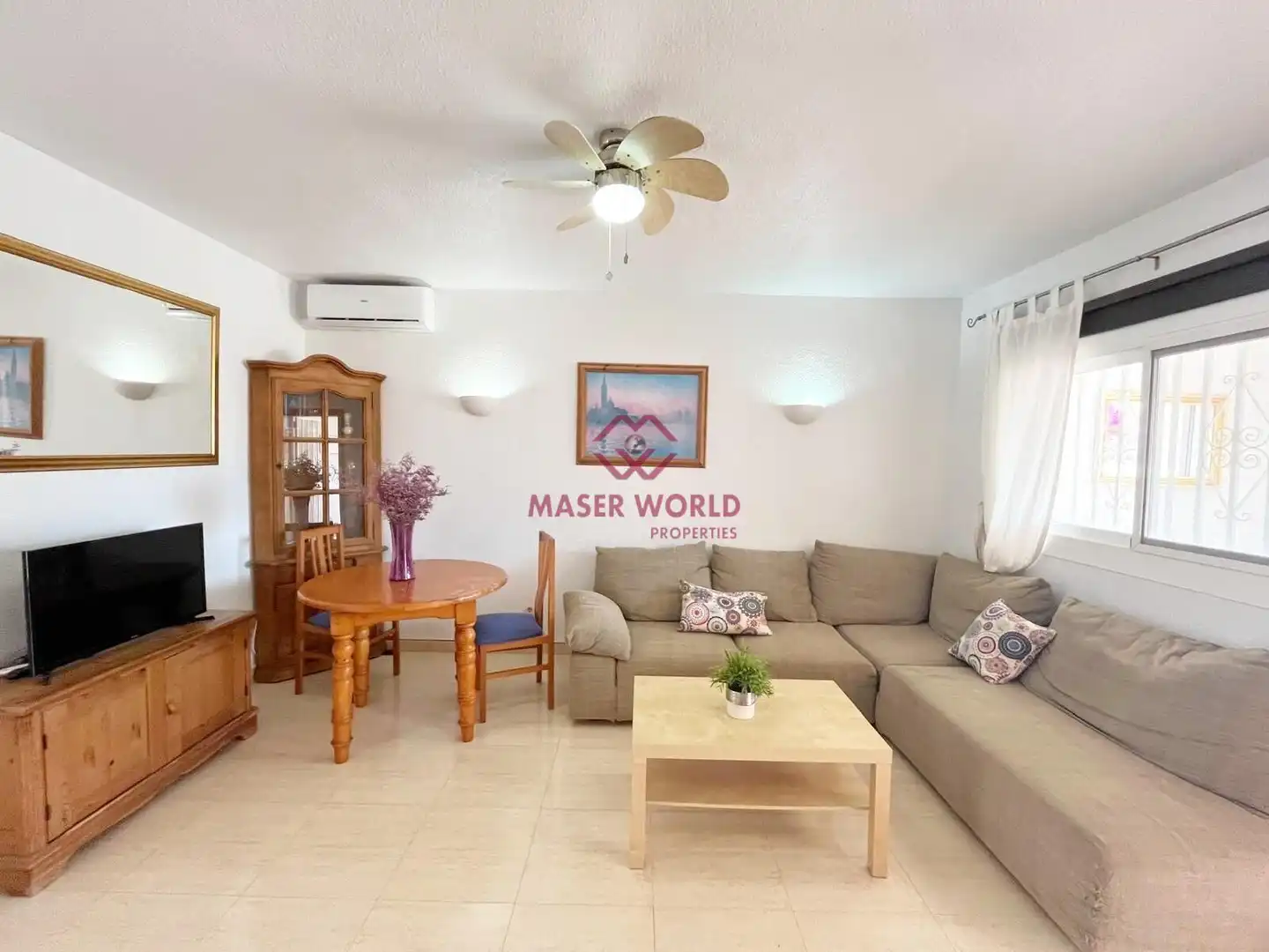Sala d'estar de Casa o xalet en venda en Mazarrón amb Aire condicionat, Calefacció i Jardí privat