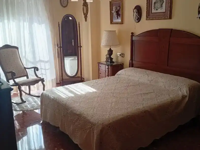 Dormitori de Casa adosada en venda en Motril amb Aire condicionat, Jardí privat i Moblat