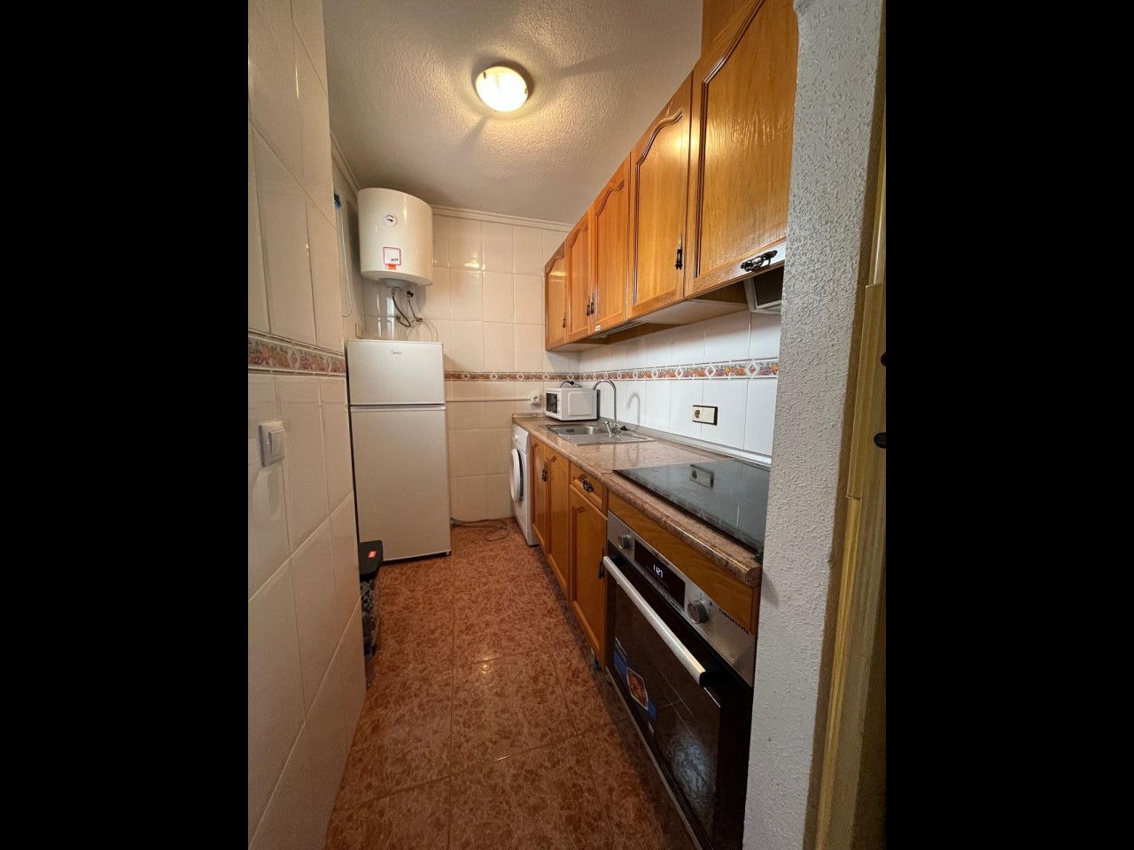 Kitchen of Attic for sale in Torrevieja  with Air Conditioner, Heating and Terrace