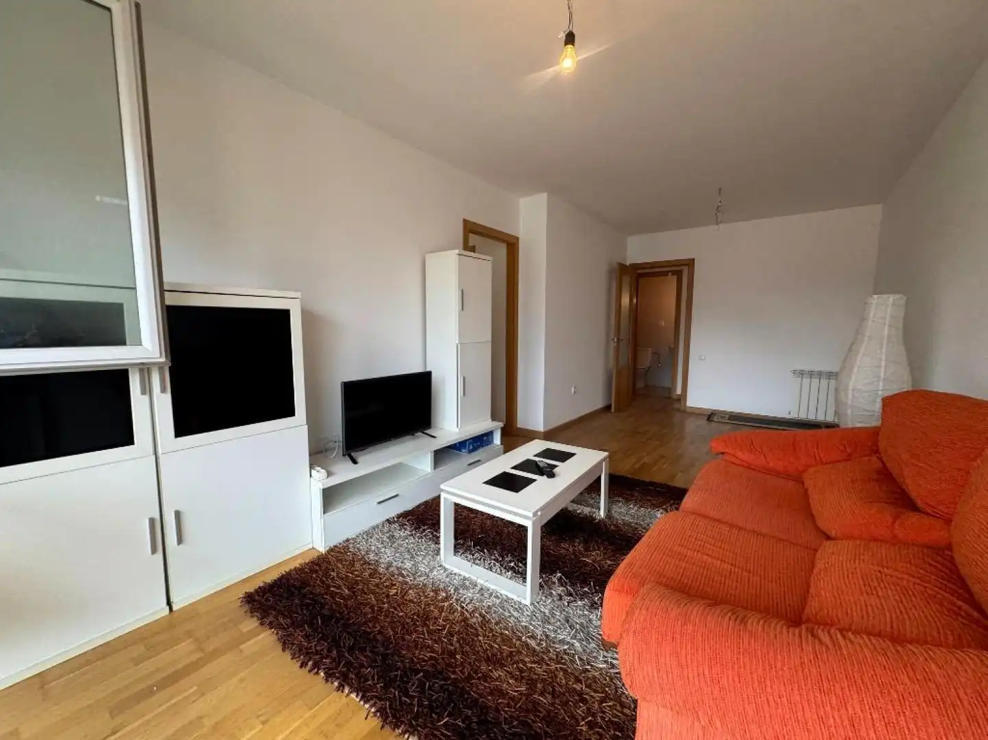 Sala de estar de Piso en venta en Los Corrales de Buelna  con Calefacción, Parquet y Terraza
