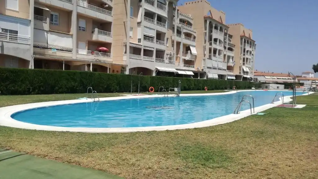 Piscina de Apartamento en venta en El Portil con Terraza, Trastero y Amueblado