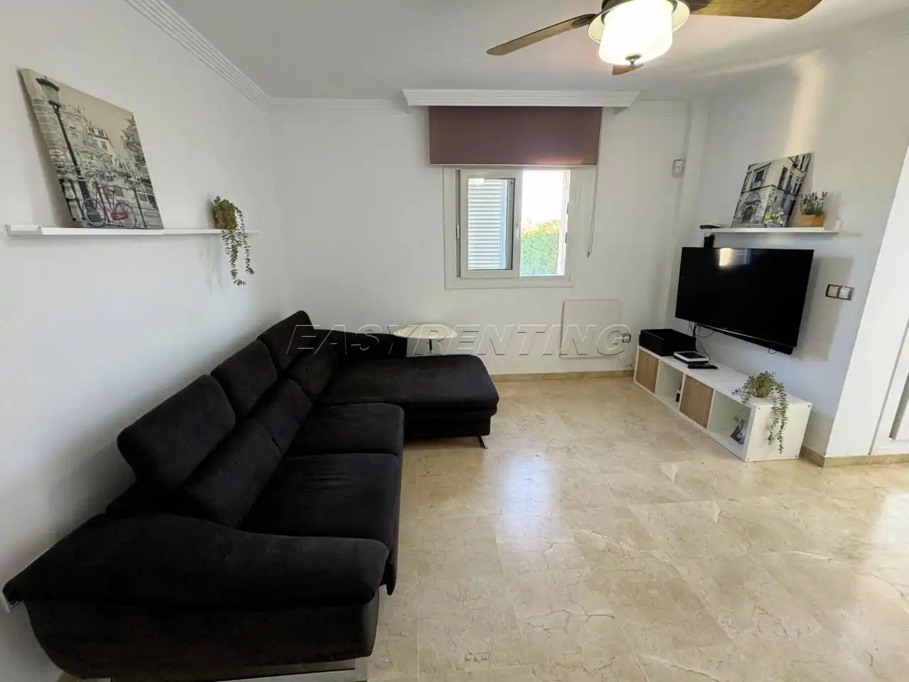 Sala d'estar de Casa adosada de lloguer en La Línea de la Concepción amb Terrassa, Moblat i Piscina comunitària