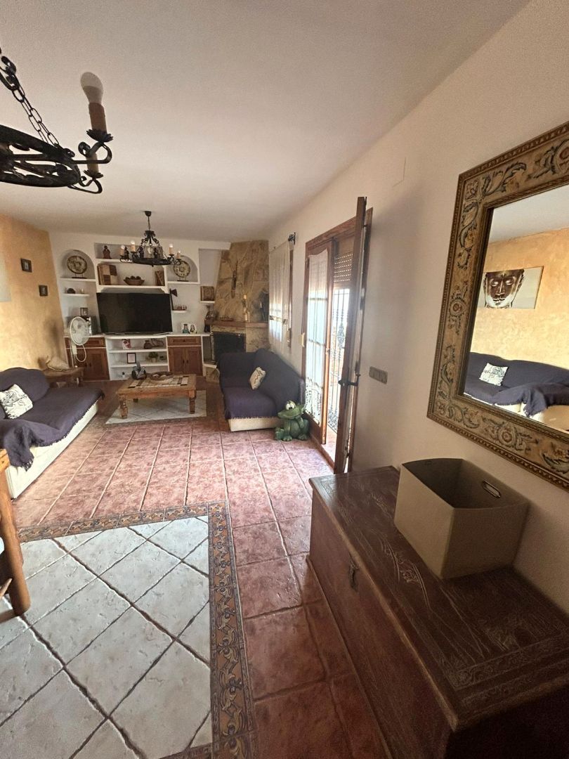 Living room of Single-family semi-detached for sale in Málaga Capital  with Air Conditioner, Terrace and Storage room