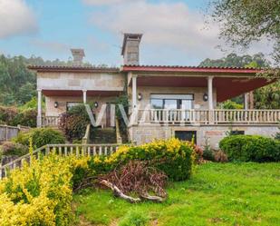 Vista exterior de Casa o xalet en venda en Sanxenxo amb Piscina