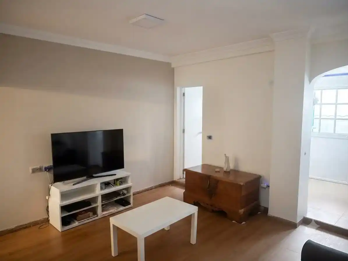 Sala d'estar de Casa adosada en venda en  Sevilla Capital amb Aire condicionat i Balcó