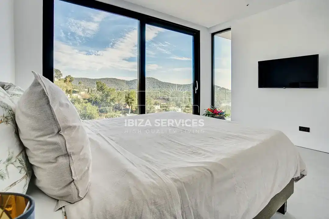 Dormitori de Casa o xalet de lloguer en Santa Eulària des Riu amb Aire condicionat, Jardí privat i Piscina