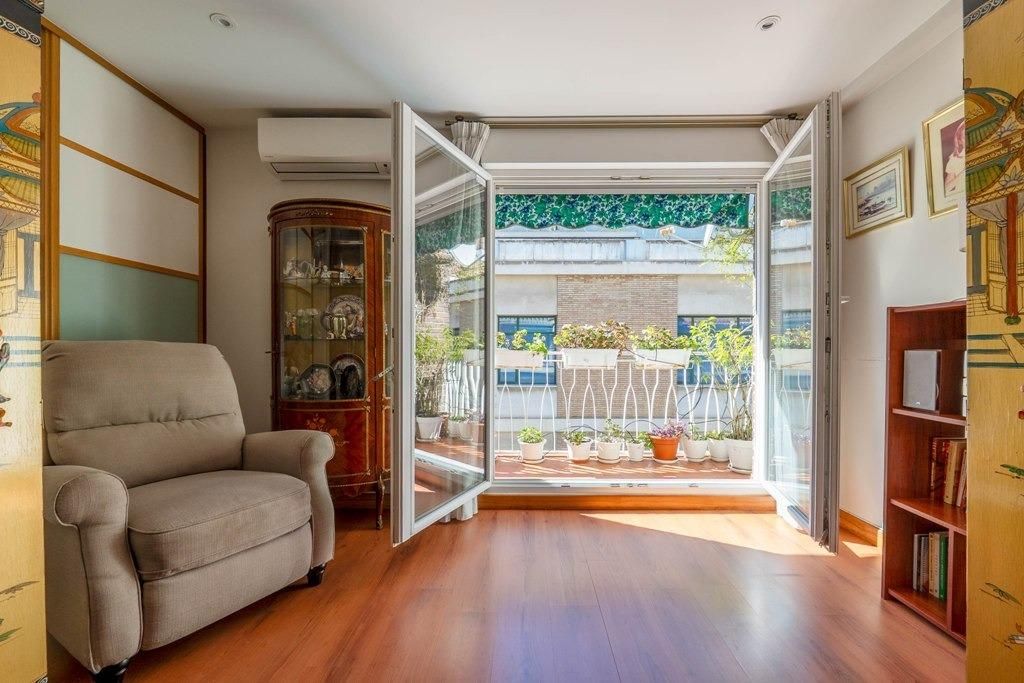 Wohnzimmer von Dachboden zum Verkauf in  Granada Capital mit Klimaanlage und Terrasse