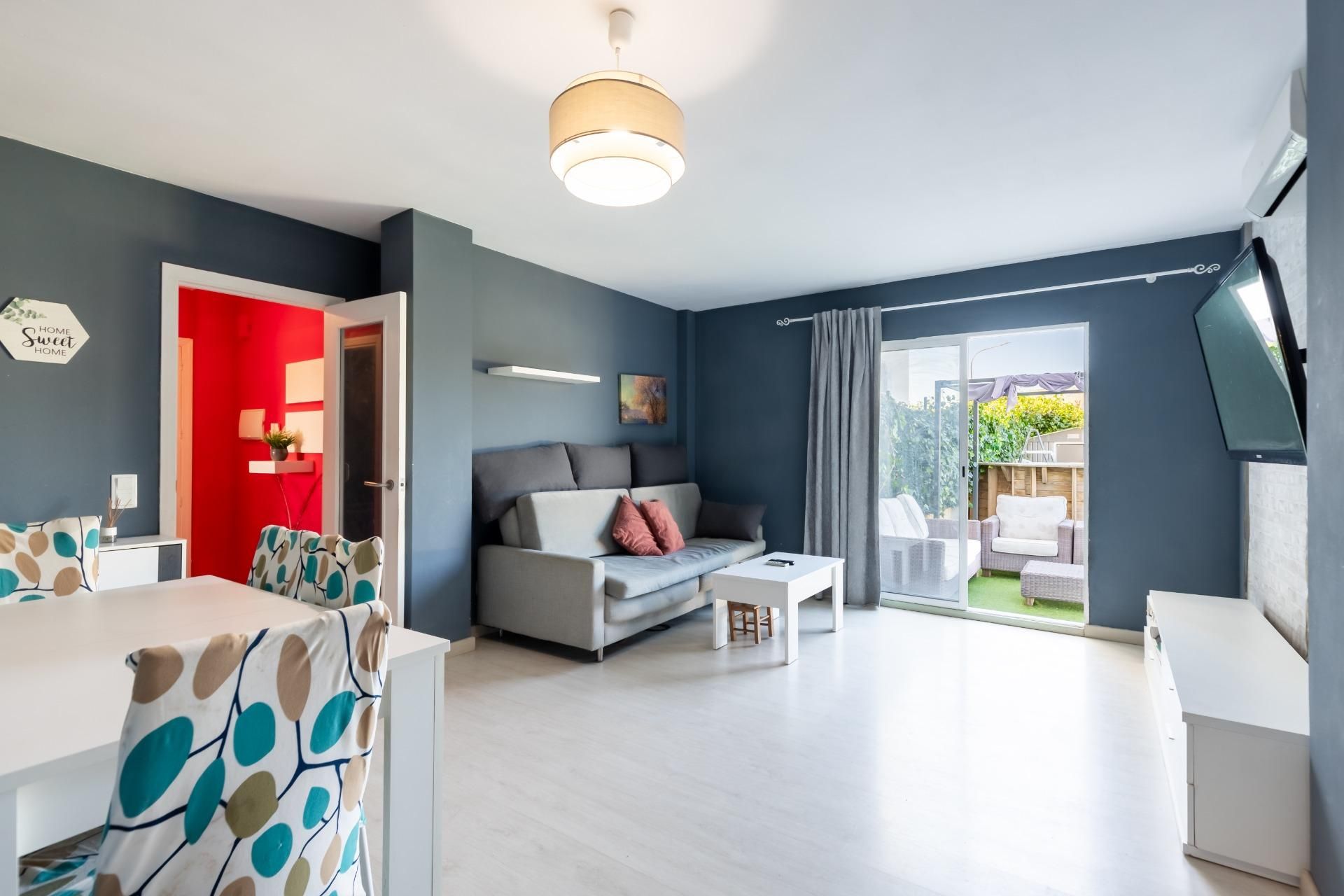 Wohnzimmer von Erdgeschoss zum Verkauf in Alcúdia mit Klimaanlage, Privatgarten und Terrasse