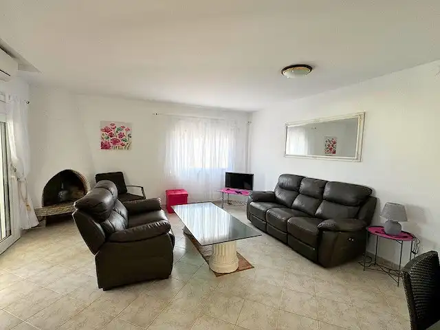 Sala de estar de Casa o chalet en venta en L'Escala con Aire acondicionado, Calefacción y Jardín privado