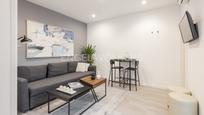 Sala d'estar de Apartament en venda en  Madrid Capital amb Aire condicionat, Calefacció i Terrassa