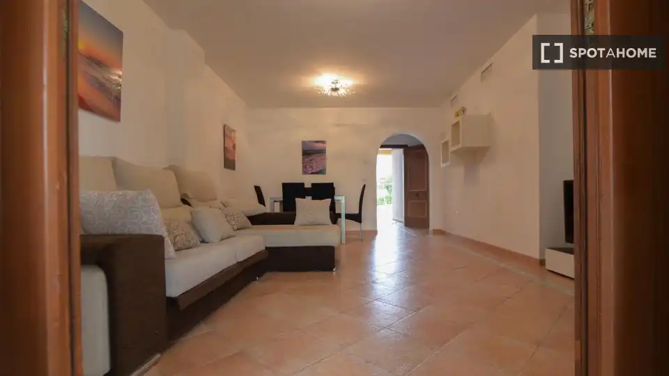 Sala de estar de Apartamento para compartir en Ayamonte con Aire acondicionado, Calefacción y Terraza