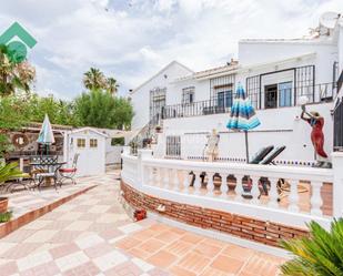Exterior view of Single-family semi-detached for sale in Vélez-Málaga  with Air Conditioner, Terrace and Furnished