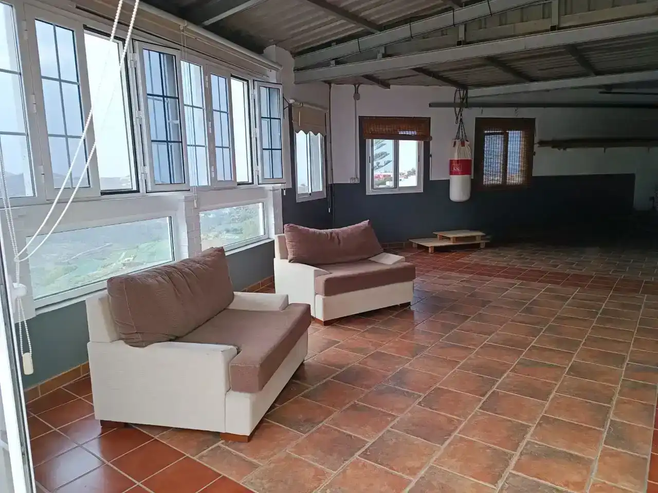 Sala d'estar de Casa adosada en venda en Moya (Las Palmas) amb Balcó