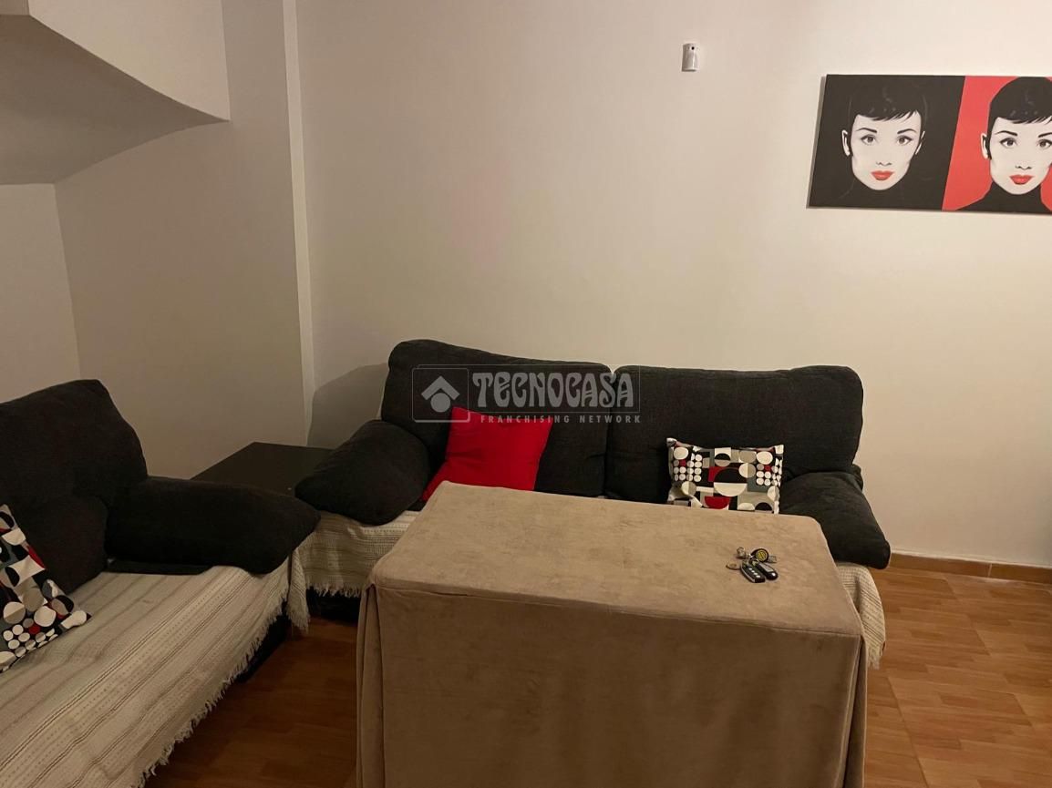 Sala d'estar de Casa adosada en venda en Iznalloz