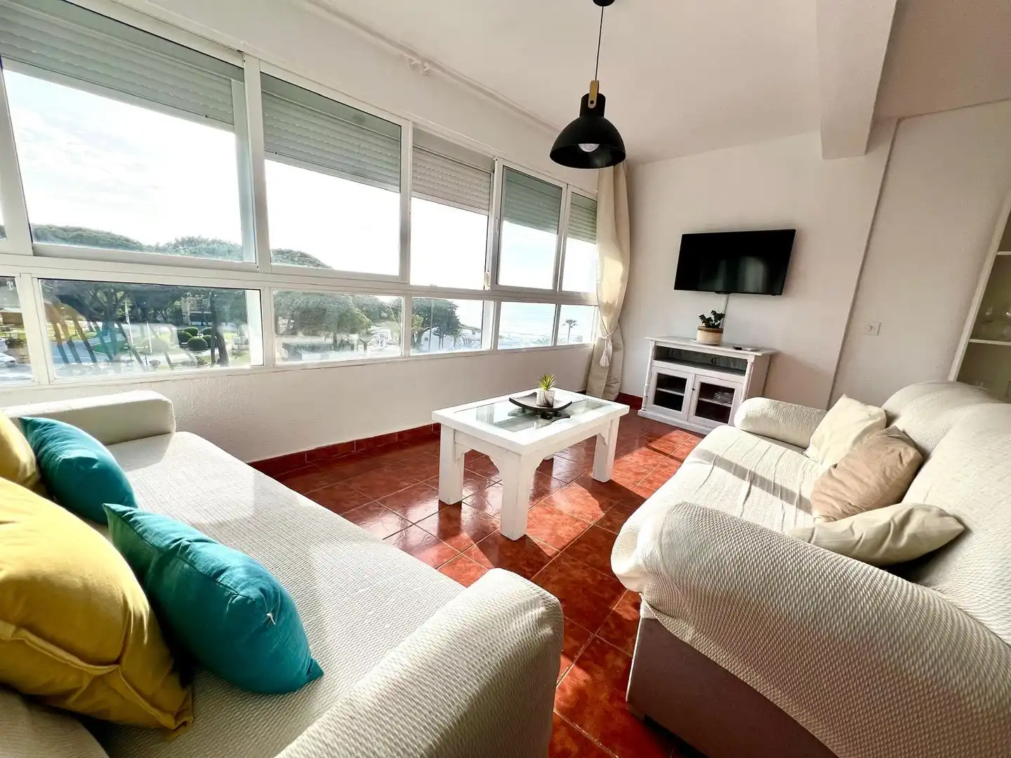 Sala d'estar de Apartament de lloguer en Mijas amb Jardí privat