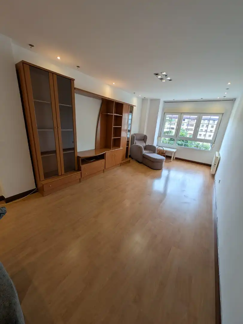 Living room of Flat for sale in Gijón   with Heating, Private garden and Parquet flooring