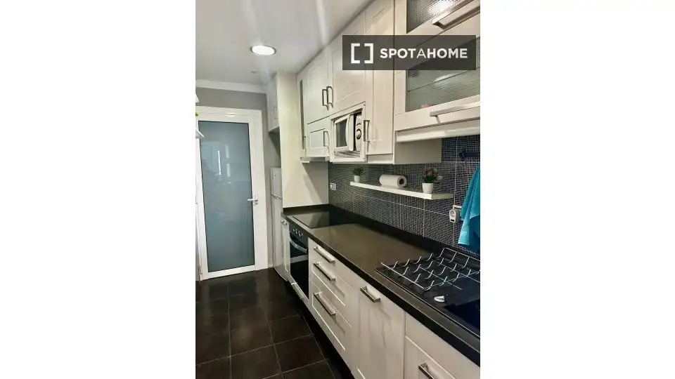 Cuina de Apartament per a compartir en Barcelona amb Aire condicionat, Calefacció i Terrassa