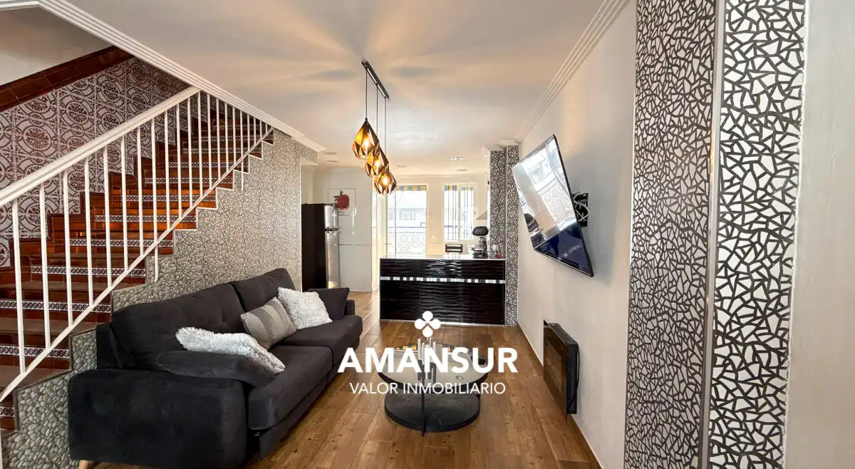 Sala de estar de Casa adosada en venta en Cartaya con Terraza y Alarma