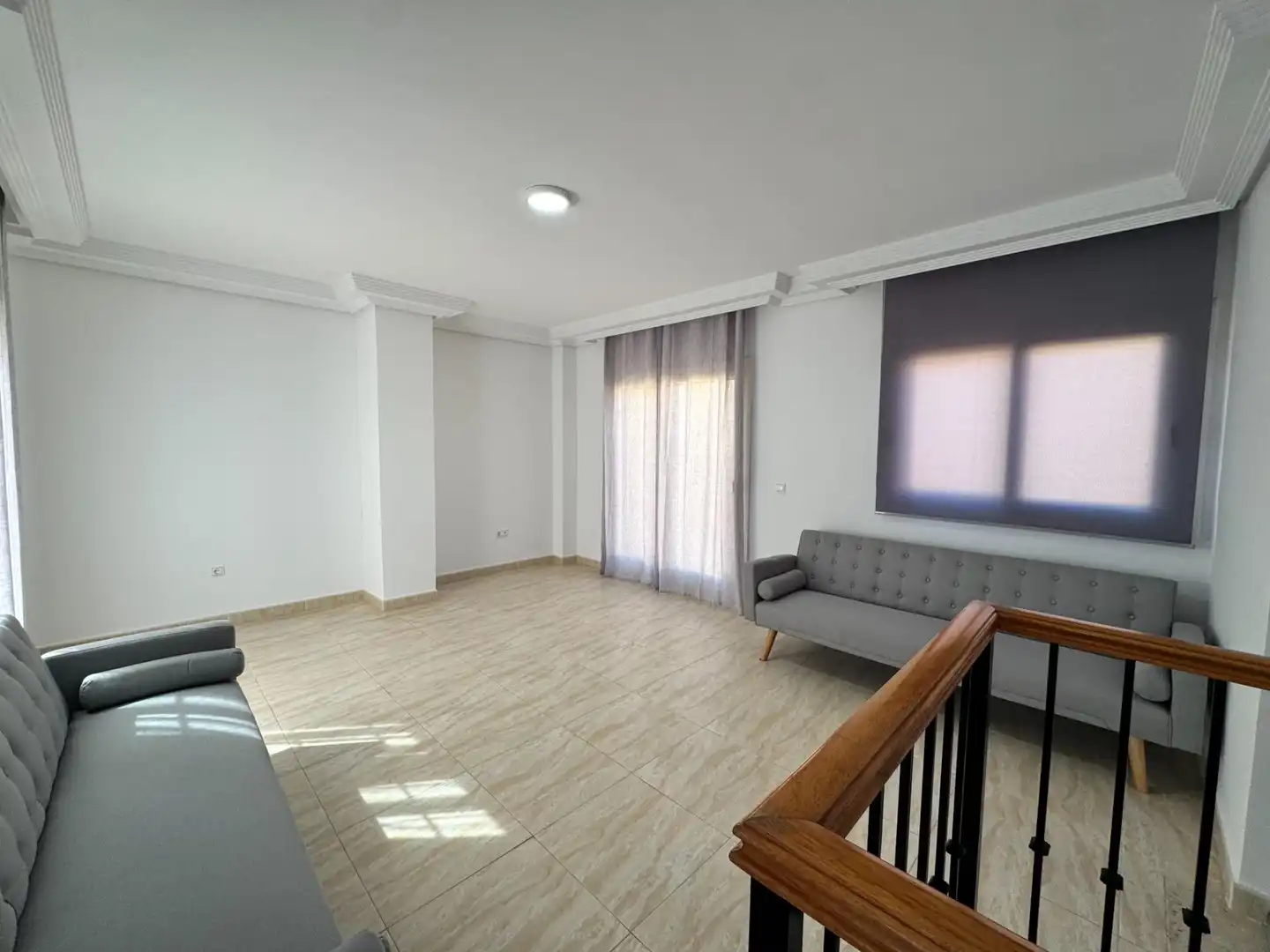 Sala d'estar de Casa adosada de lloguer en Roquetas de Mar