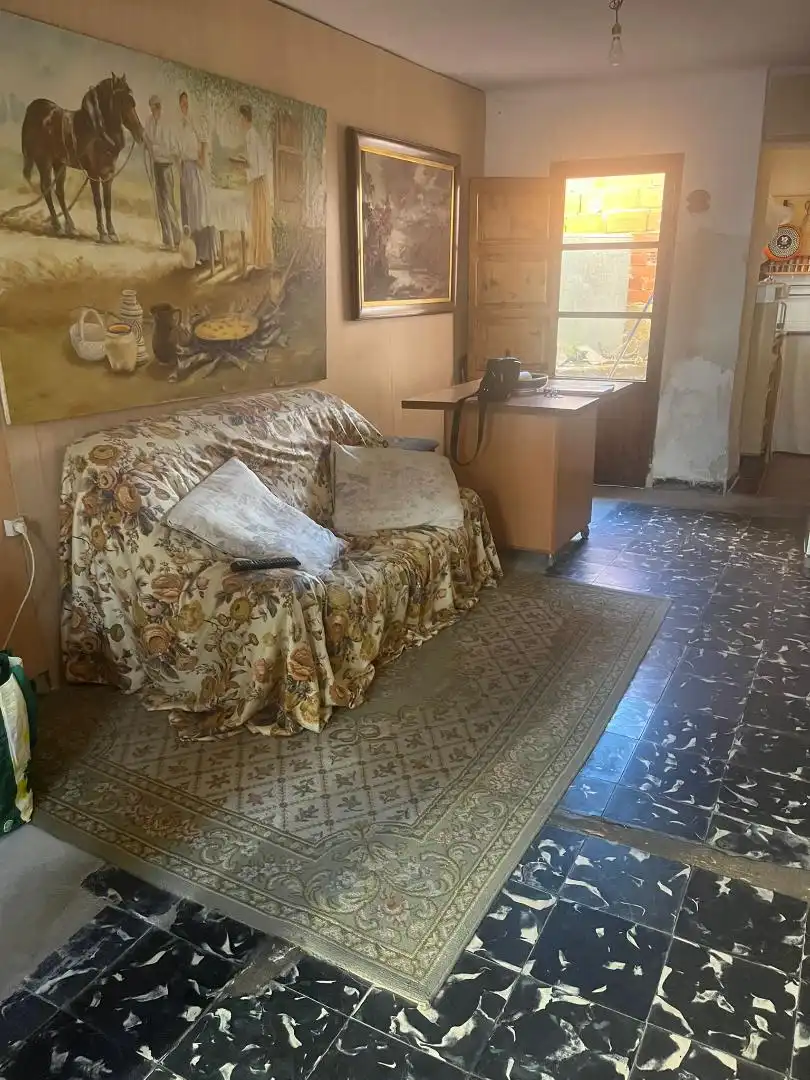 Sala d'estar de Casa adosada en venda en Montserrat amb Terrassa