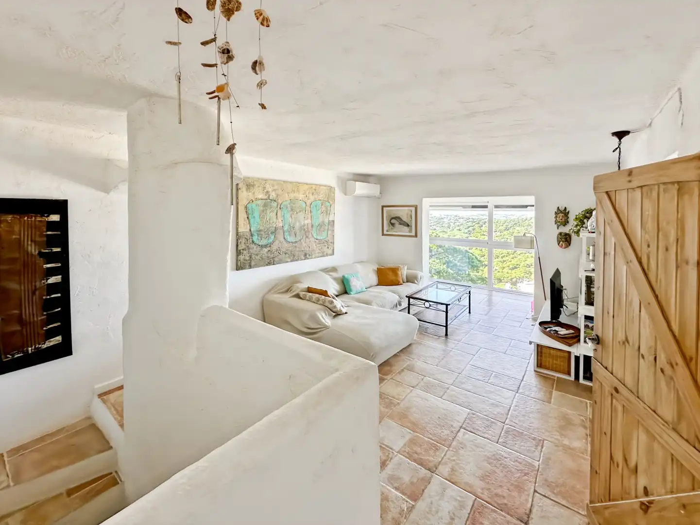 Sala d'estar de Casa adosada en venda en L'Escala amb Aire condicionat, Calefacció i Terrassa