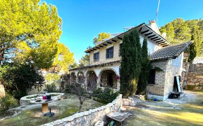 Vista exterior de Casa o xalet en venda en La Muela amb Calefacció, Jardí privat i Terrassa