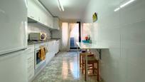 Kitchen of Flat for sale in Gandia  with Air Conditioner and Storage room