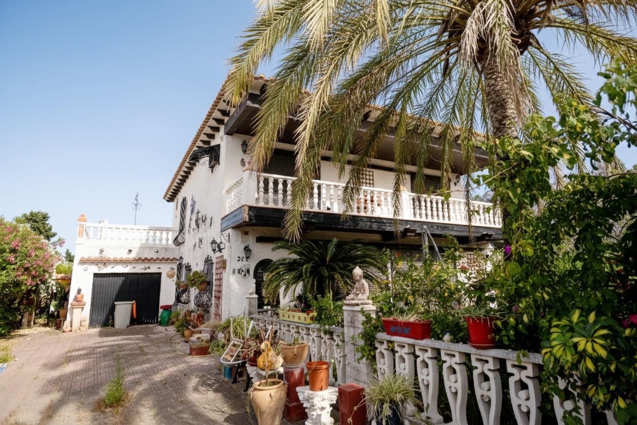 Vista exterior de Casa o xalet en venda en Els Poblets amb Calefacció, Jardí privat i Terrassa