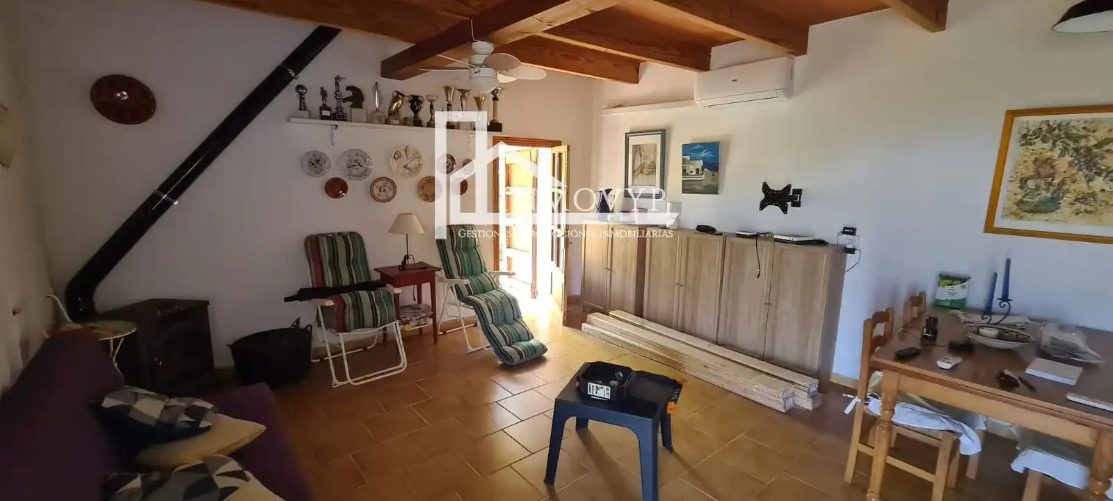 Sala de estar de Finca rústica en venta en Escorca con Aire acondicionado y Amueblado