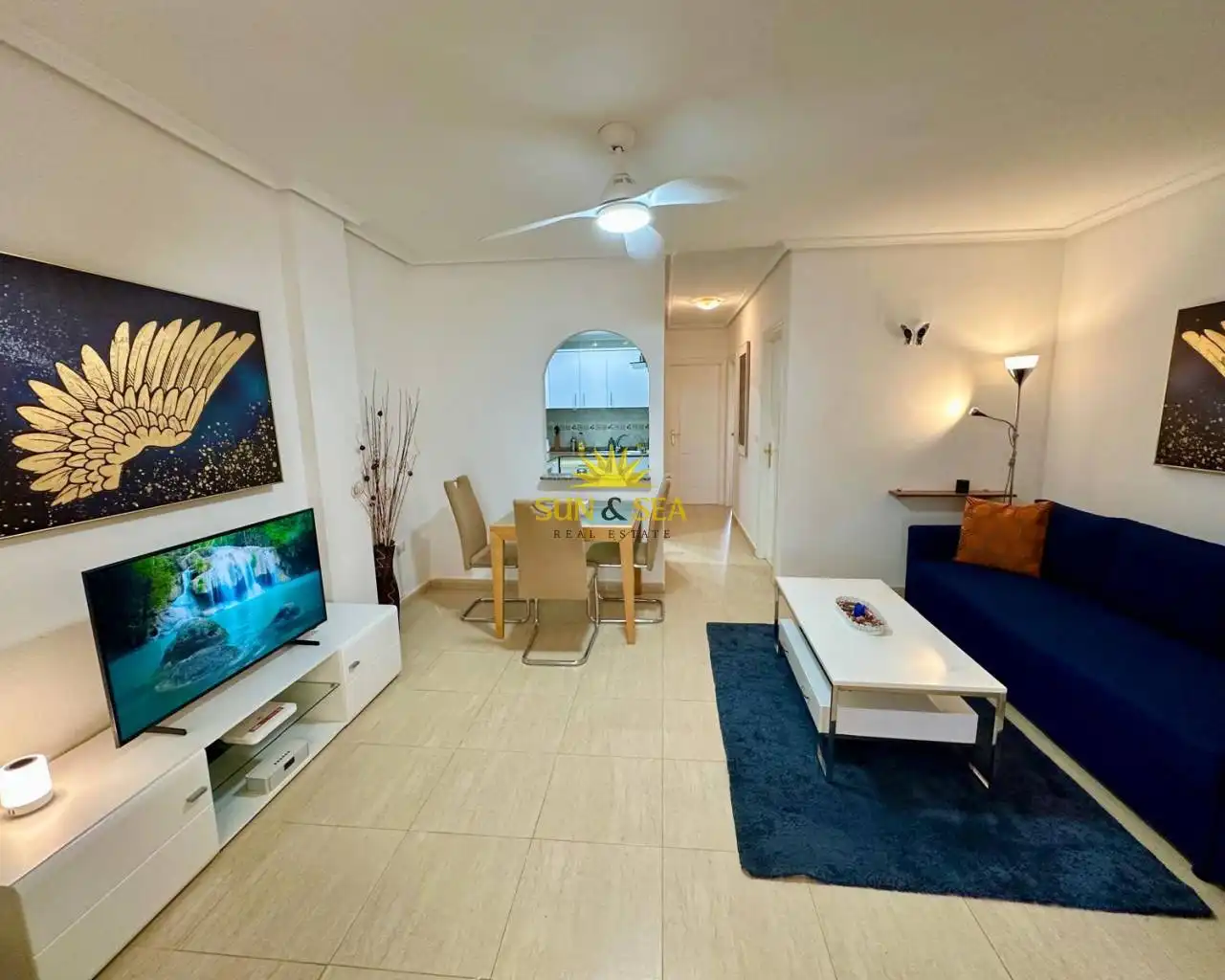 Sala de estar de Apartamento de alquiler en Daya Nueva con Aire acondicionado, Piscina y Amueblado