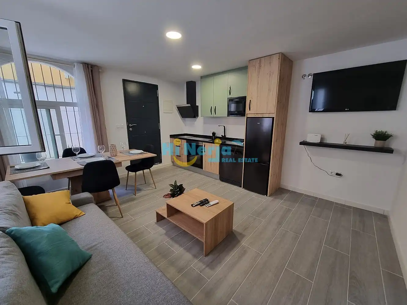Sala d'estar de Apartament en venda en Torrox amb Aire condicionat, Calefacció i Jardí privat