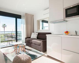 Sala d'estar de Apartament de lloguer en Castelldefels amb Aire condicionat i Terrassa