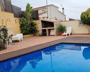 Swimming pool of Single-family semi-detached for sale in Calafell  with Air Conditioner, Terrace and Storage room