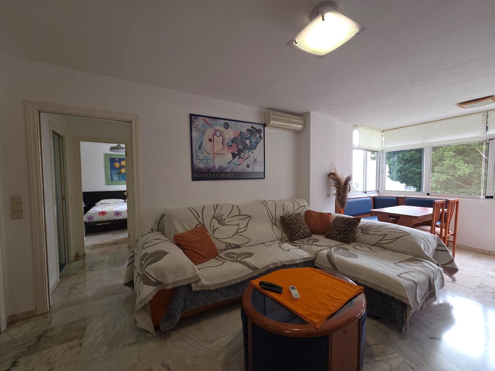 Living room of Flat for sale in Benalmádena  with Air Conditioner, Private garden and Balcony