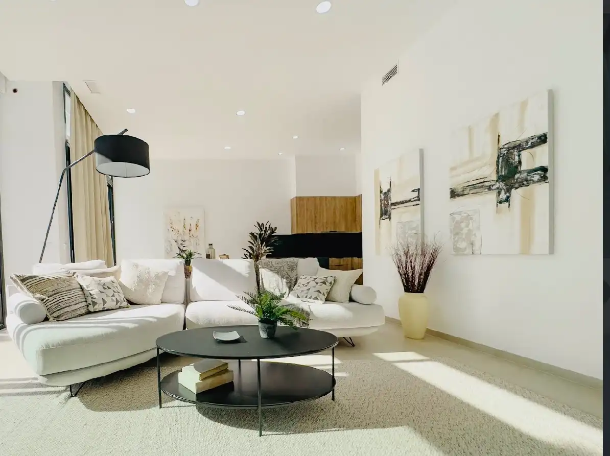 Sala d'estar de Casa adosada en venda en Calpe / Calp amb Aire condicionat, Calefacció i Jardí privat
