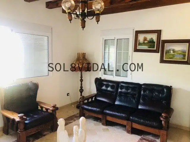 Sala d'estar de Casa o xalet en venda en Orihuela amb Aire condicionat, Jardí privat i Terrassa