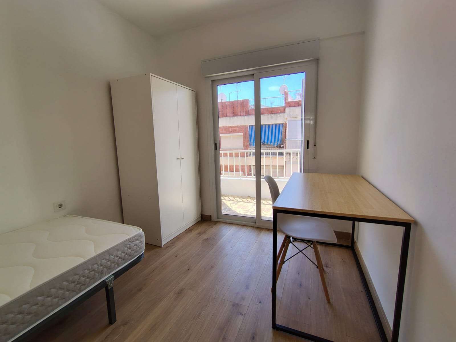 Dormitori de Pis per a compartir en Silla amb Aire condicionat i Terrassa