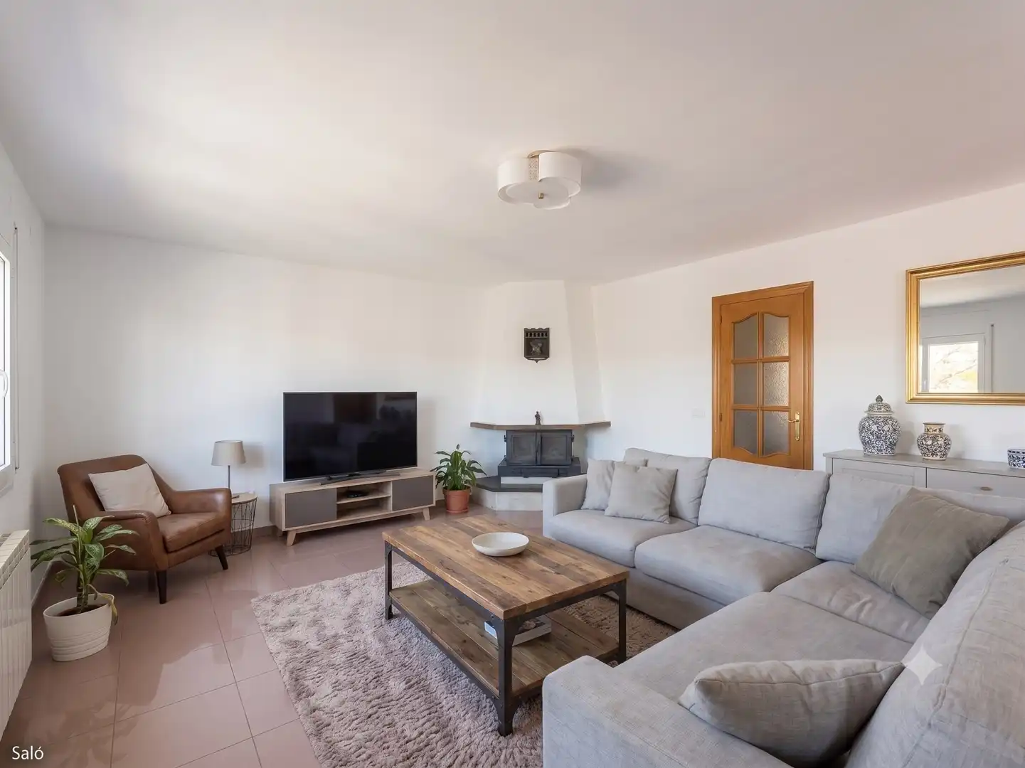 Sala de estar de Casa adosada en venta en Salt con Calefacción, Terraza y Trastero