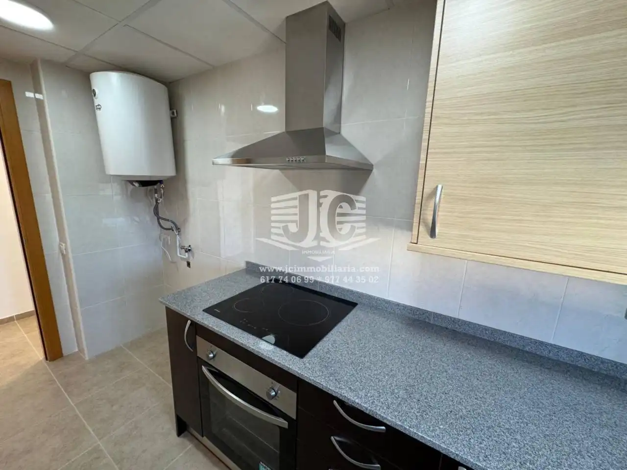 Kitchen of Flat for rent in L'Aldea  with Balcony and Alarm