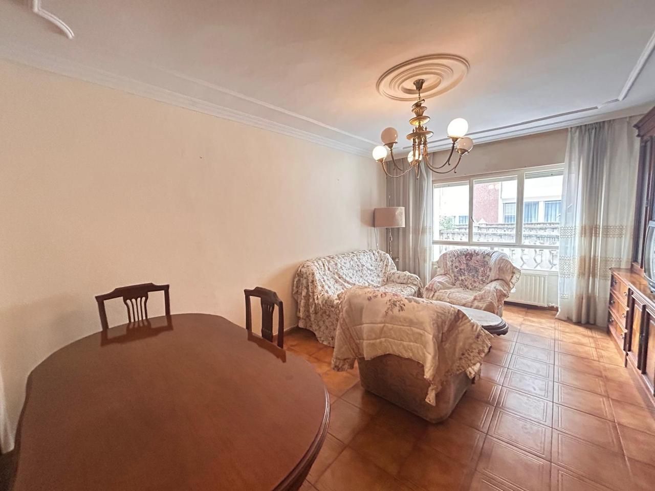 Living room of Flat for sale in Gijón   with Heating, Terrace and Furnished