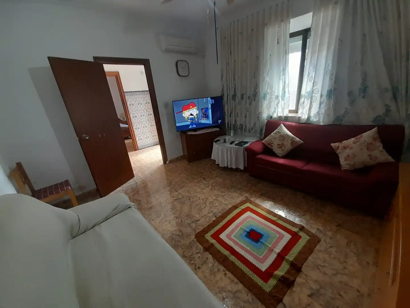 Sala d'estar de Casa adosada en venda en Puertollano amb Aire condicionat i Traster
